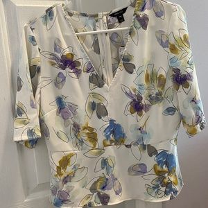 V-neck peplum blouse (multicolour)